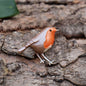Enamelled robin bird brooch presented in a gift box