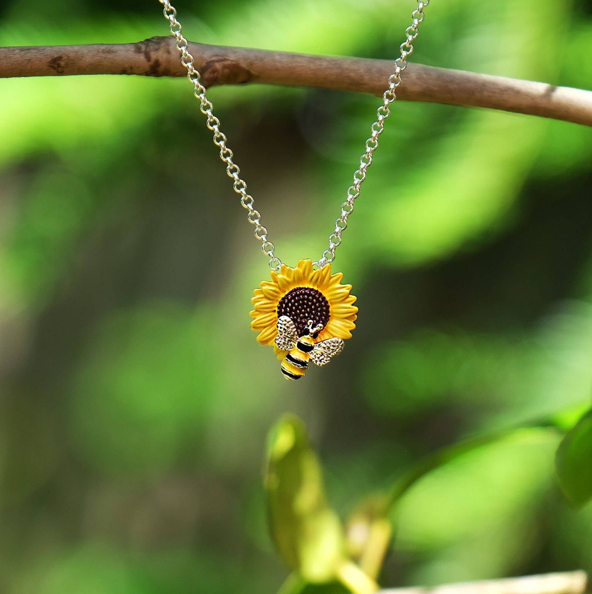 Silver-plated sunflower and bee pendant necklace